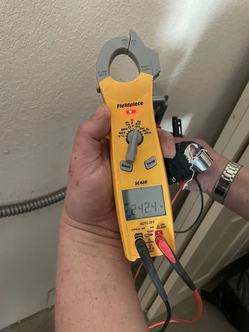 Voltage testing with clamp meter during Generator Installation in Morro Bay